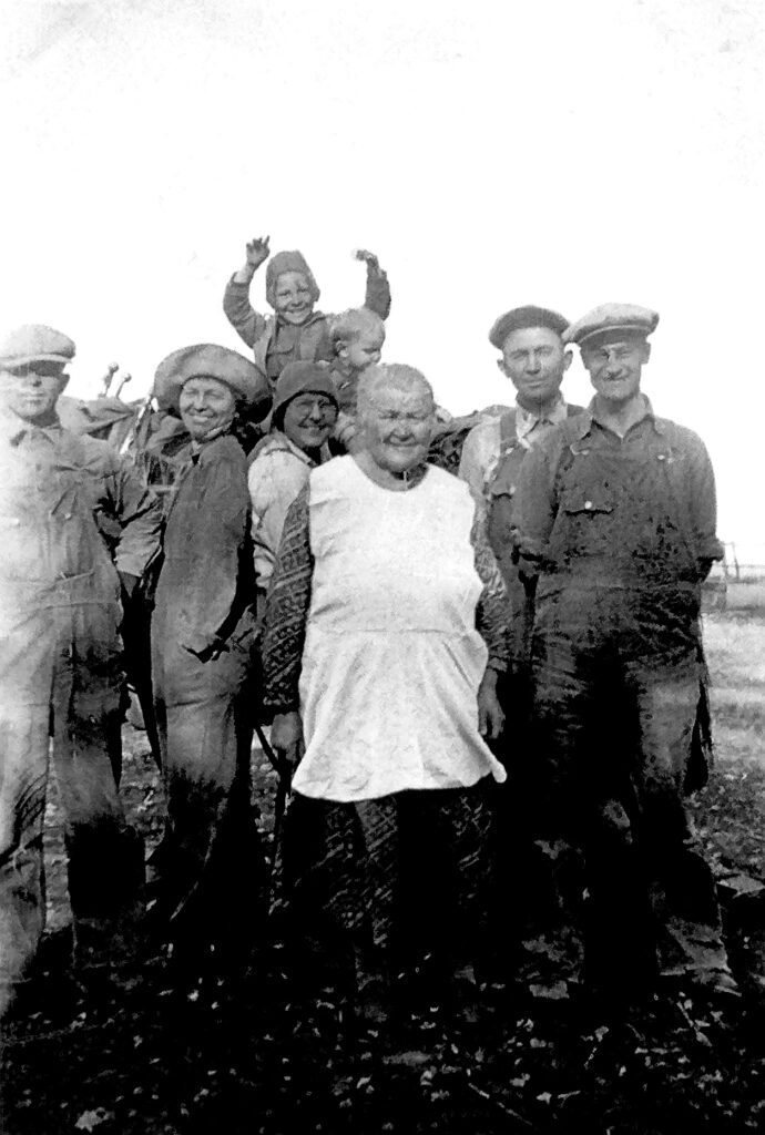 Anna Dahl and family farm workers