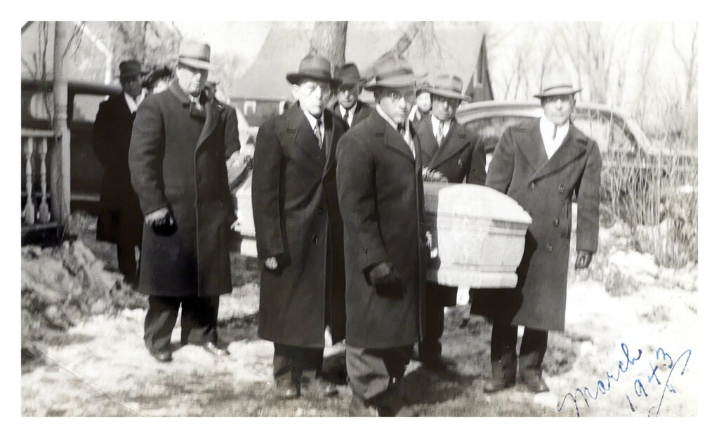 Family members carry the casket of Anna Dahl